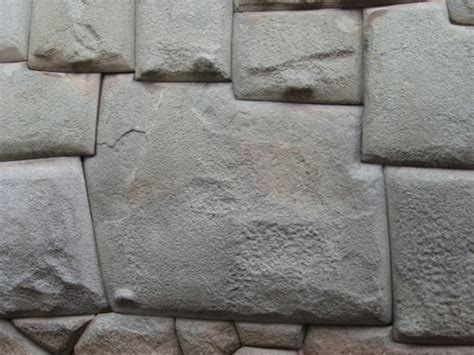 How do Inca walls stay together without cement?