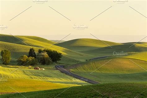 Rolling hills at sunset containing fields, sunset, and hills | High ...