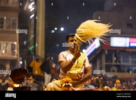 Ganga aarti, Portrait of an young priest performing river ganges ...