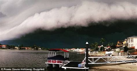 Storms bring Gold Coast Airport to a standstill | Daily Mail Online