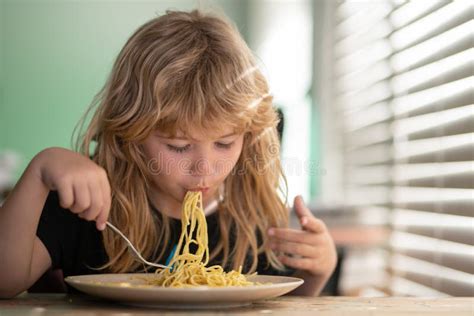 Tasty Food, Messy Child Eating Spaghetti Happy Child Boy with Spoon ...