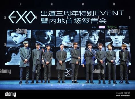 Members of South Korean-Chinese boy group EXO pose at their first signing event in mainland ...