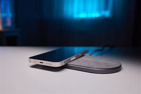 Premium Photo | Smartphone wireless charging on induction charger wireless charger