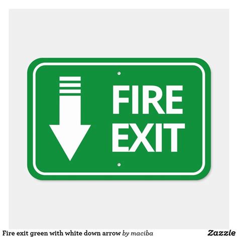 a green fire exit sign with an arrow pointing to the right