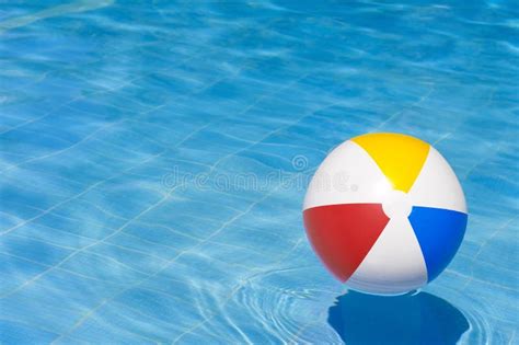 Colorful Inflatable Ball Floating in Swimming Pool Stock Photo - Image ...