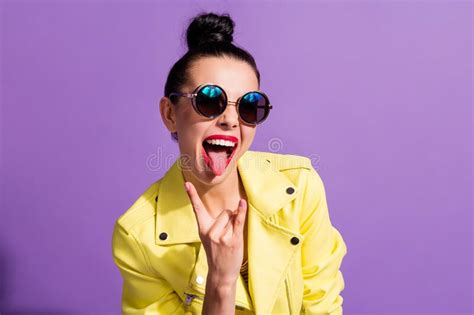 Photo of Crazy Youth Girl Show Horns Symbol Stick-out Tongue Over Purple Color Background Stock ...
