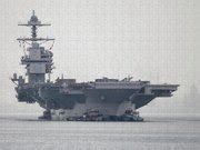 The aircraft carrier USS Gerald R Ford departs Naval Station Norfolk ...