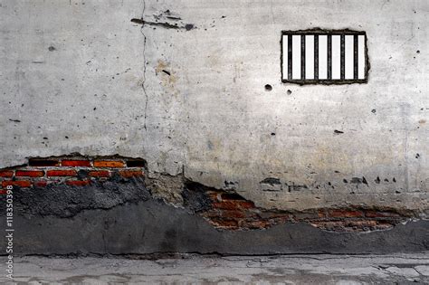 prison, brick wall with cracks texture background. high contrast and ...