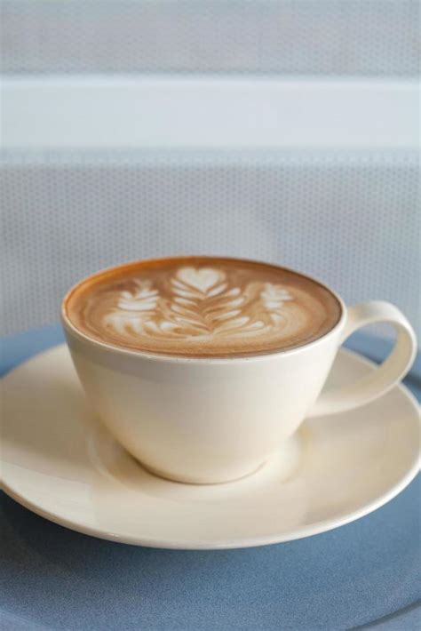 Close-up latte art coffee 11040844 Stock Photo at Vecteezy