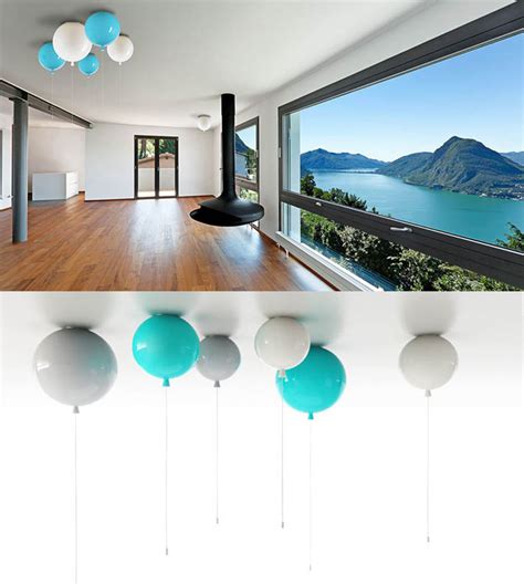 If It's Hip, It's Here (Archives): Glass Balloon Ceiling and Wall Lamps Add A Festive Touch.