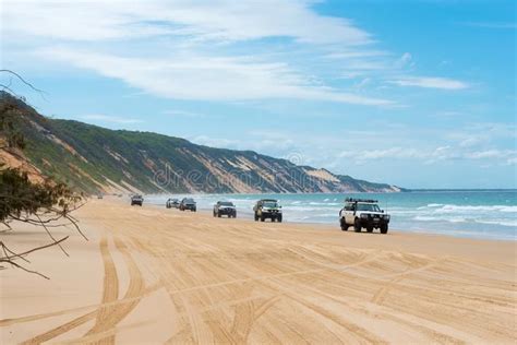 4wd vehicles at Rainbow Beach with coloured sand dunes, QLD, Australia. Rainbow , #spon, #Beach ...