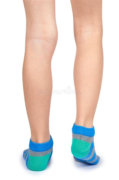 Kid Legs in Striped Socks Isolated on White Background, Copy Space ...