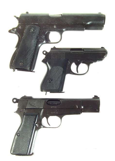 Lot 145 - Three Denix replica pistols LICENCE REQUIRED