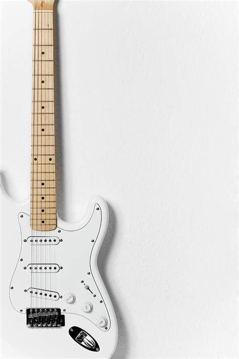 White Electric Guitar by Stock4b Creative