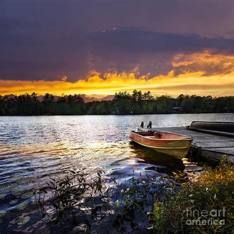 Boat on lake at sunset Photograph by Elena Elisseeva | Fine Art America