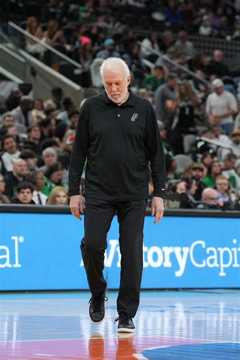 San Antonio Spurs head coach Gregg Popovich looks down during a second ...