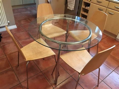 IKEA glass dining table and 4 chairs for sale. REDUCED!! | in Abbeymead, Gloucestershire | Gumtree