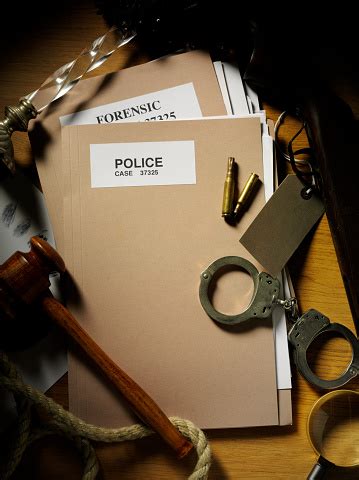 Police Case File With Surrounding Evidence Stock Photo - Download Image ...