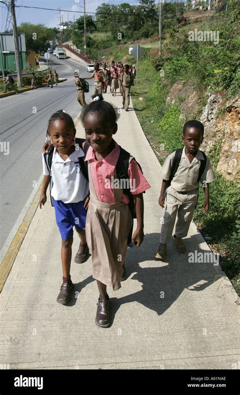 Jamaican school children walk home from school Stock Photo - Alamy