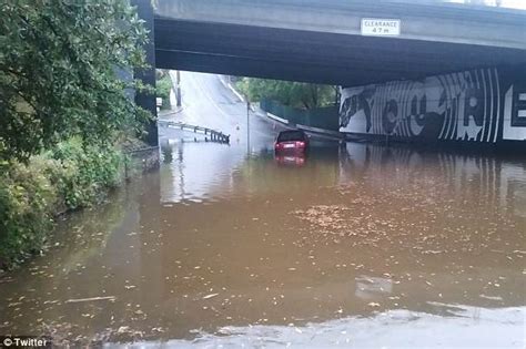 Hobart weather: Residents told to stay indoors as city lashed by rain ...