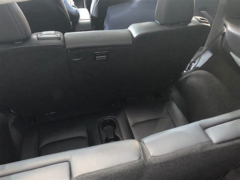 Tesla Model Y 3rd Row Pictures Reveal Little Leg Room | iPhone in ...