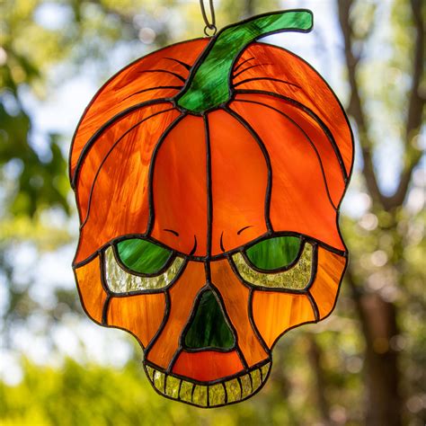 Orange stained glass Halloween pumpkin skull ghastly window hanging