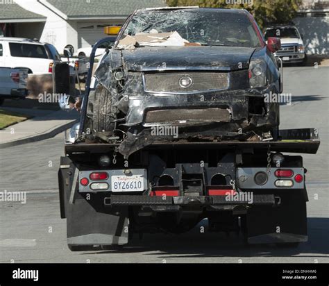 Flatbed truck carrying car hi-res stock photography and images - Alamy