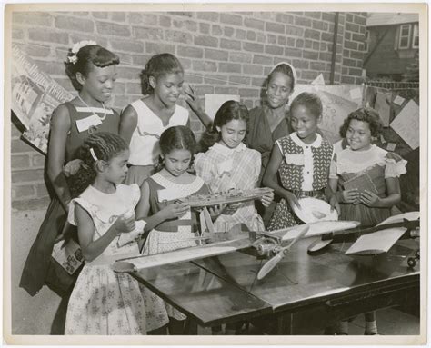 Civil rights activist Ella Baker (standing third from right) with a group of young and teenage ...