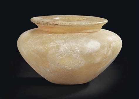 AN EGYPTIAN ALABASTER JAR , EARLY DYNASTIC-OLD KINGDOM, 2ND-4TH DYNASTY, CIRCA 2750-2450 B.C ...