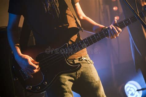 Rock Music Theme, Bass Guitar Player Stock Photo - Image of heavy, electric: 106709404