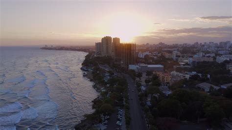 Premium stock video - Flying over malecon in santo domingo at sunset