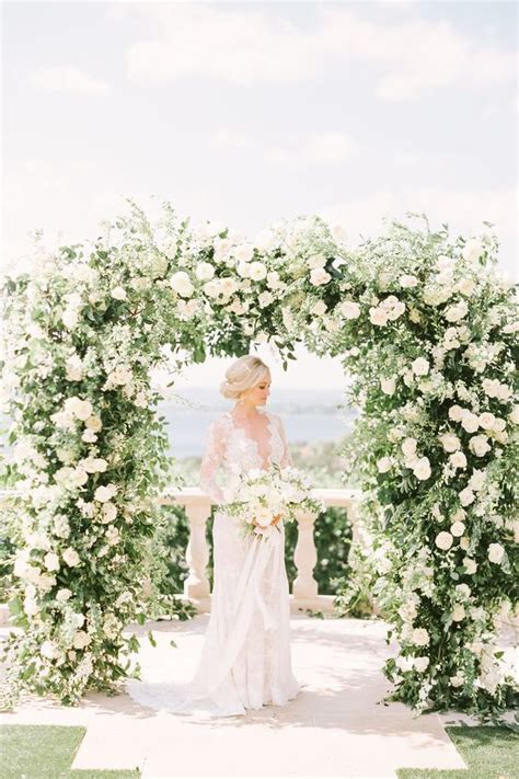 27 Lush Floral Wedding Arches That Impress | Wedding arbors, White wedding arch