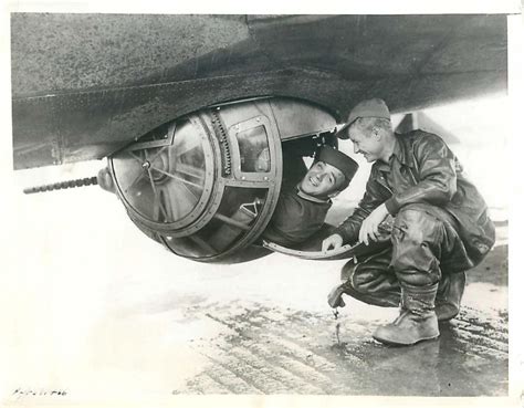 1943- U.S. 8th Air Force gunner climbs into the Sperry ball turret of a ...