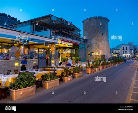 Italy Sicily Province of Palermo Mondello Restaurants in the evening Stock Photo - Alamy