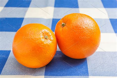 Two orange | High-Quality Food Images ~ Creative Market