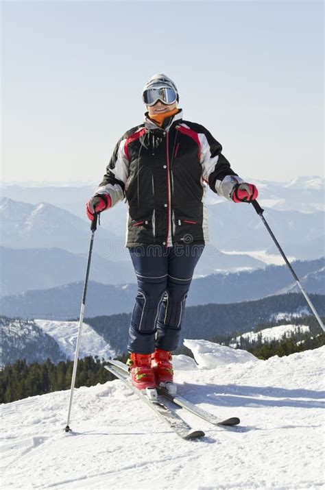 Skier on the mountain top stock image. Image of sayan - 23930955