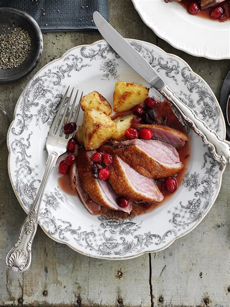 Roast duck with cranberry and sour cherry sauce recipe - olive magazine