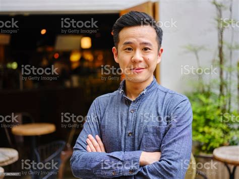 Young Professional Man Working In A Small Coffee Shop Stock Photo - Download Image Now - iStock