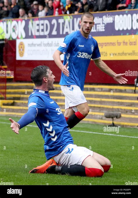 Rangers kyle lafferty celebrates with his team mates hi-res stock ...