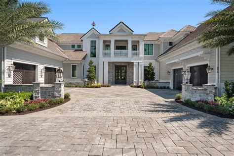 A Breathtakingly Landscaped Home in Naples comes to market at $13.9M