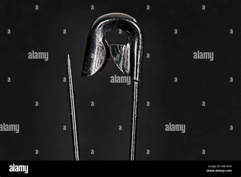 Black safety pin Stock Photo - Alamy