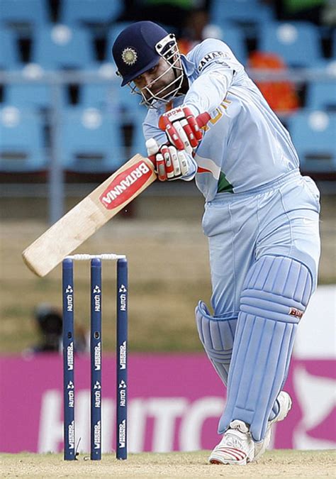 Virender Sehwag drives on his way to his half-century | ESPNcricinfo.com