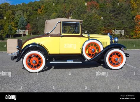 Antique 1931 Ford Model "A" with an unusual but authentic paint scheme. The colors of the car ...