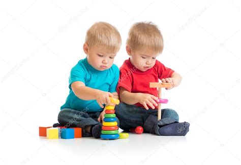 Children playing wooden toys together — Stock Photo © Andrey_Kuzmin #53625931