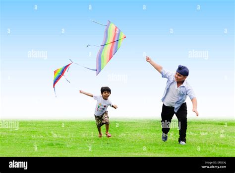 2 indian children friend park Kite Flying Stock Photo - Alamy