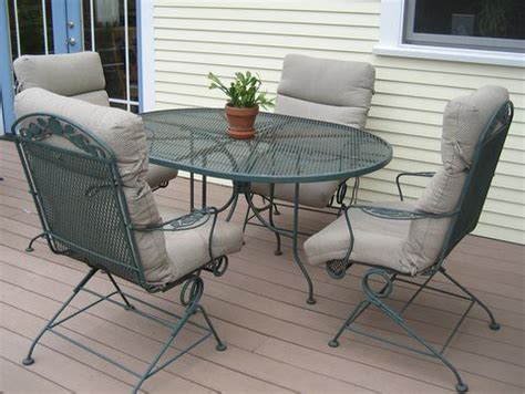 Wrought iron patio table w/ chairs | Comfortable outdoor din… | Flickr