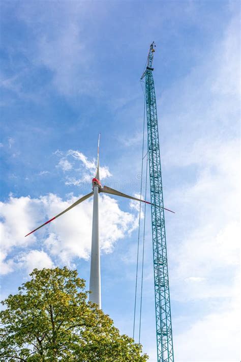 Large Wind Farm with Many Wind Turbines is Built Near a Small Town in ...