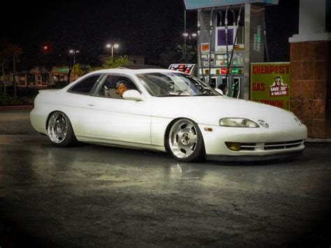 White Lexus Coupe at Gas Station