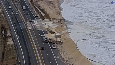 VIDEO: Waves breach dune at Indian River Inlet, flooding closes Route 1 ...