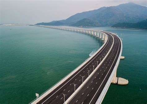 China launches world's longest sea bridge - Hong Kong-mainland mega ...